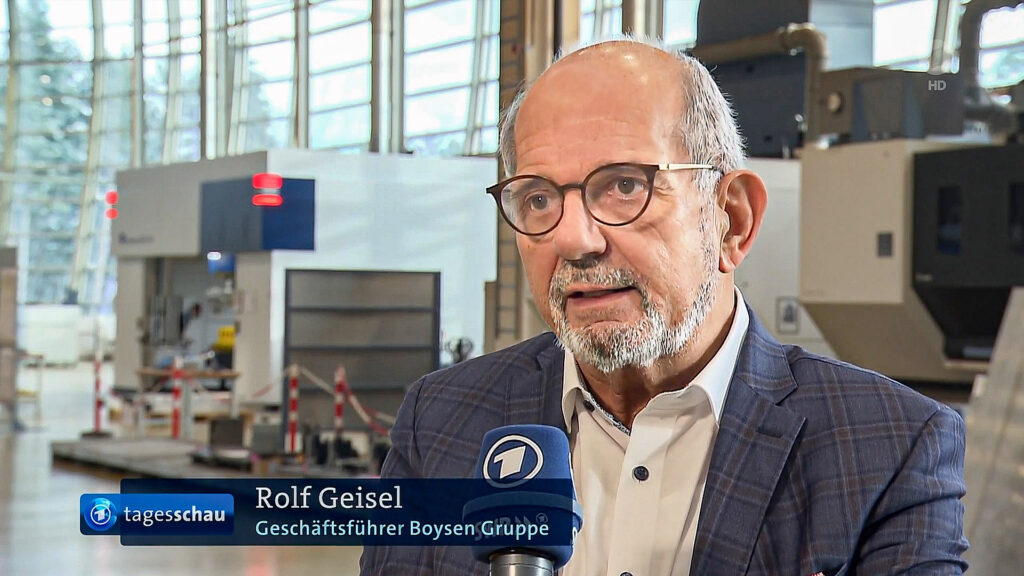 Die Kapitalbeschaffung ist für Mittelständler eine große Herausforderung bei der  Bewältigung der Automotive-Transformation, sagt Boysen-Chef Rolf Geisel in einem ARD-Beitrag der Tagesschau zum Auto-Gipfel. ©TV-Screenshot:GerdLache